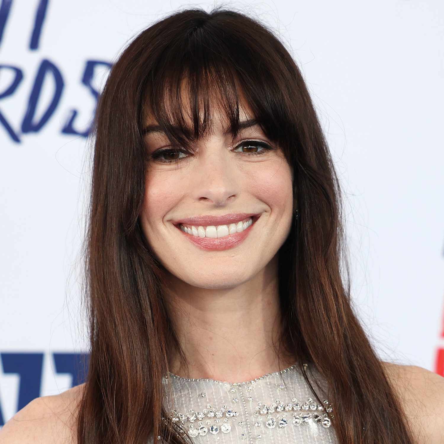 Anne Hathaway wears French bangs to a film premiere