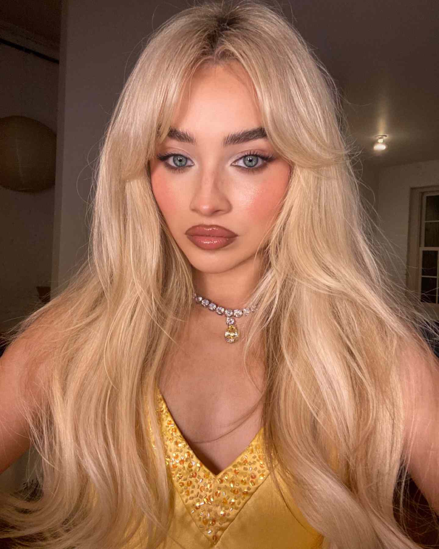 Sabrina Carpenter with Bardot Bangs