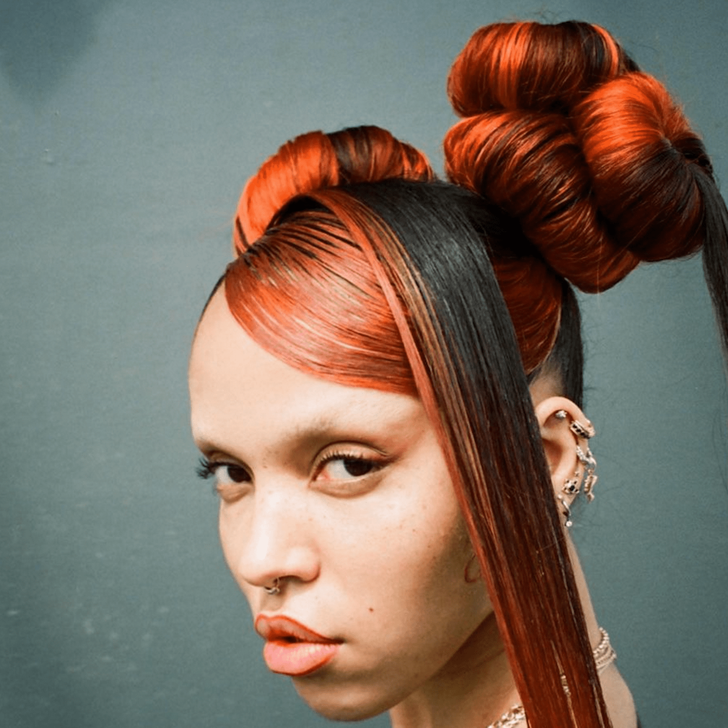 FKA Twigs with gradient red hair