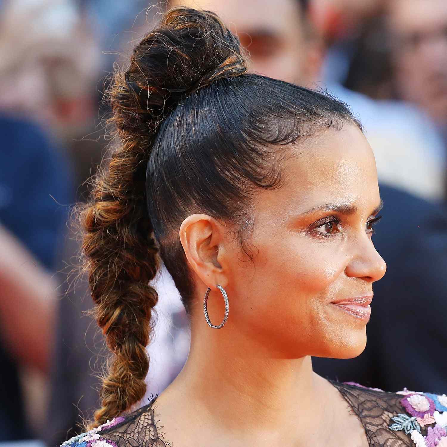 Halle Berry wears a lifted fishtail braid from the crown of her head at TIFF