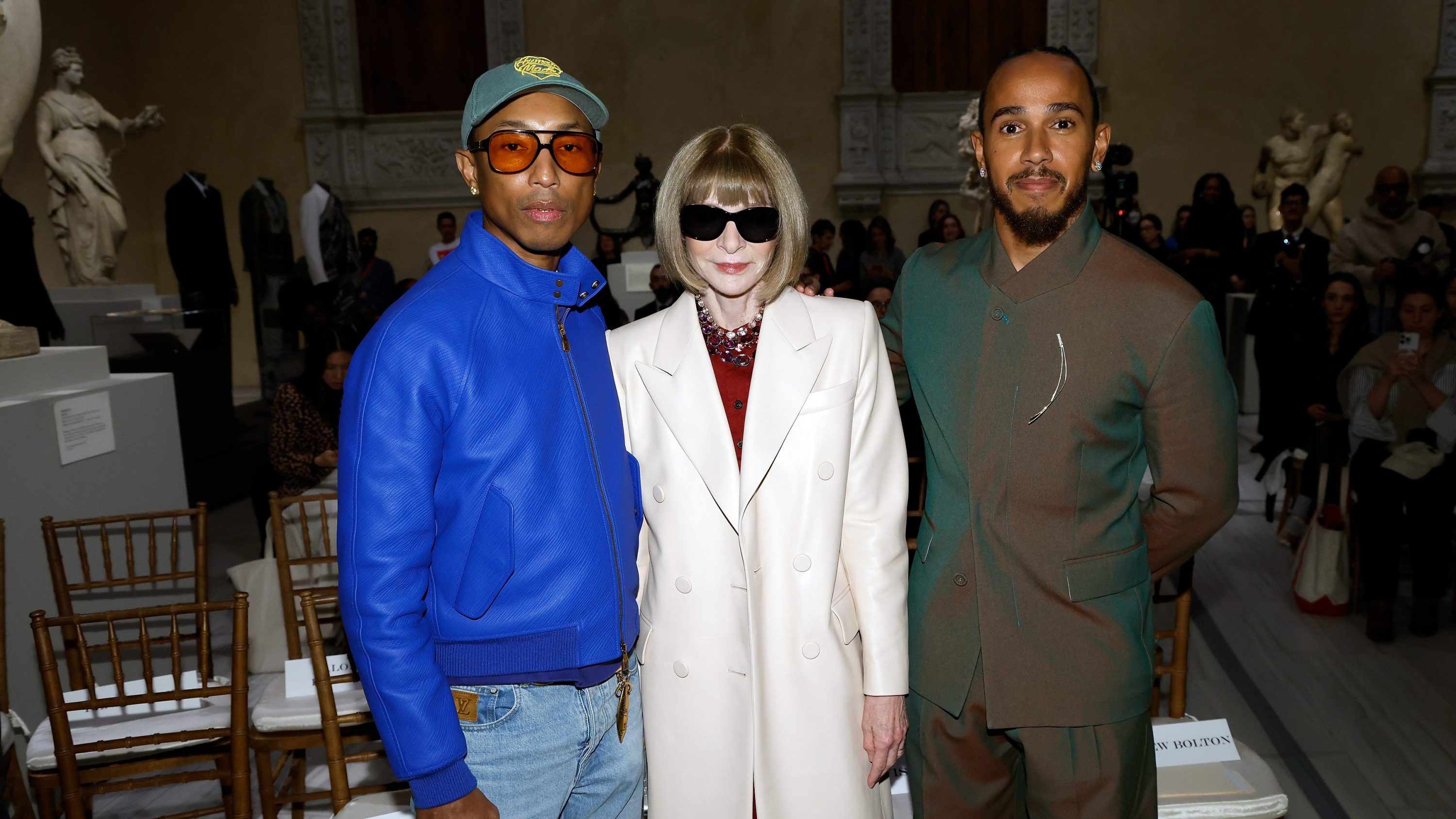 Pharrell Williams, Anna Wintour, and Lewis Hamilton attend a press conference announcing the Spring 2025 Costume Institute exhibition "Superfine: Tailoring Black Style" at Metropolitan Museum of Art on October 09, 2024 in New York City.