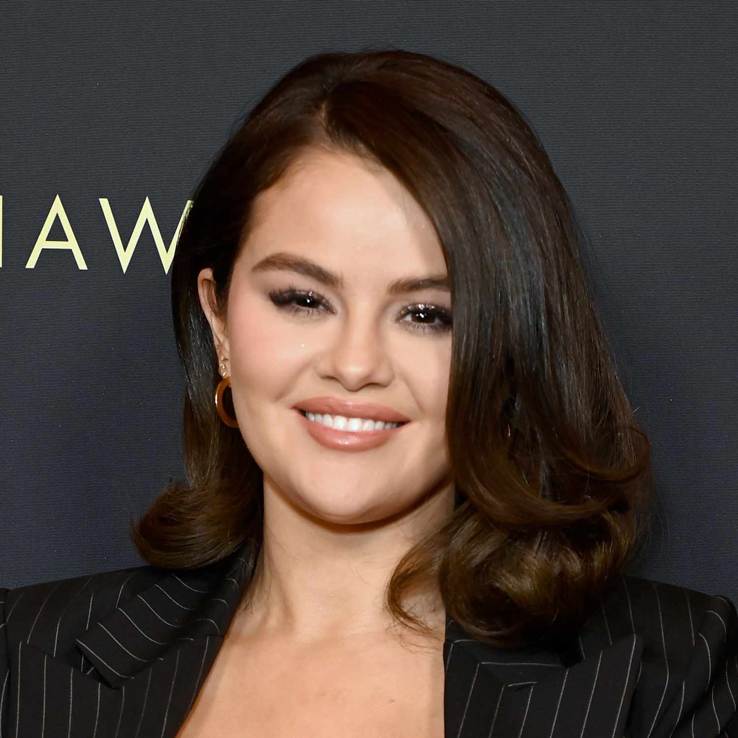 Selena Gomez softens the old Hollywood hair style on a longer bob with a softer curl on her ends