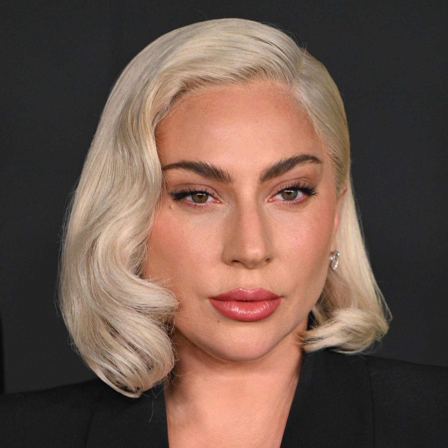 Lady Gaga wears her platinum bob in a soft old Hollywood hairstyle