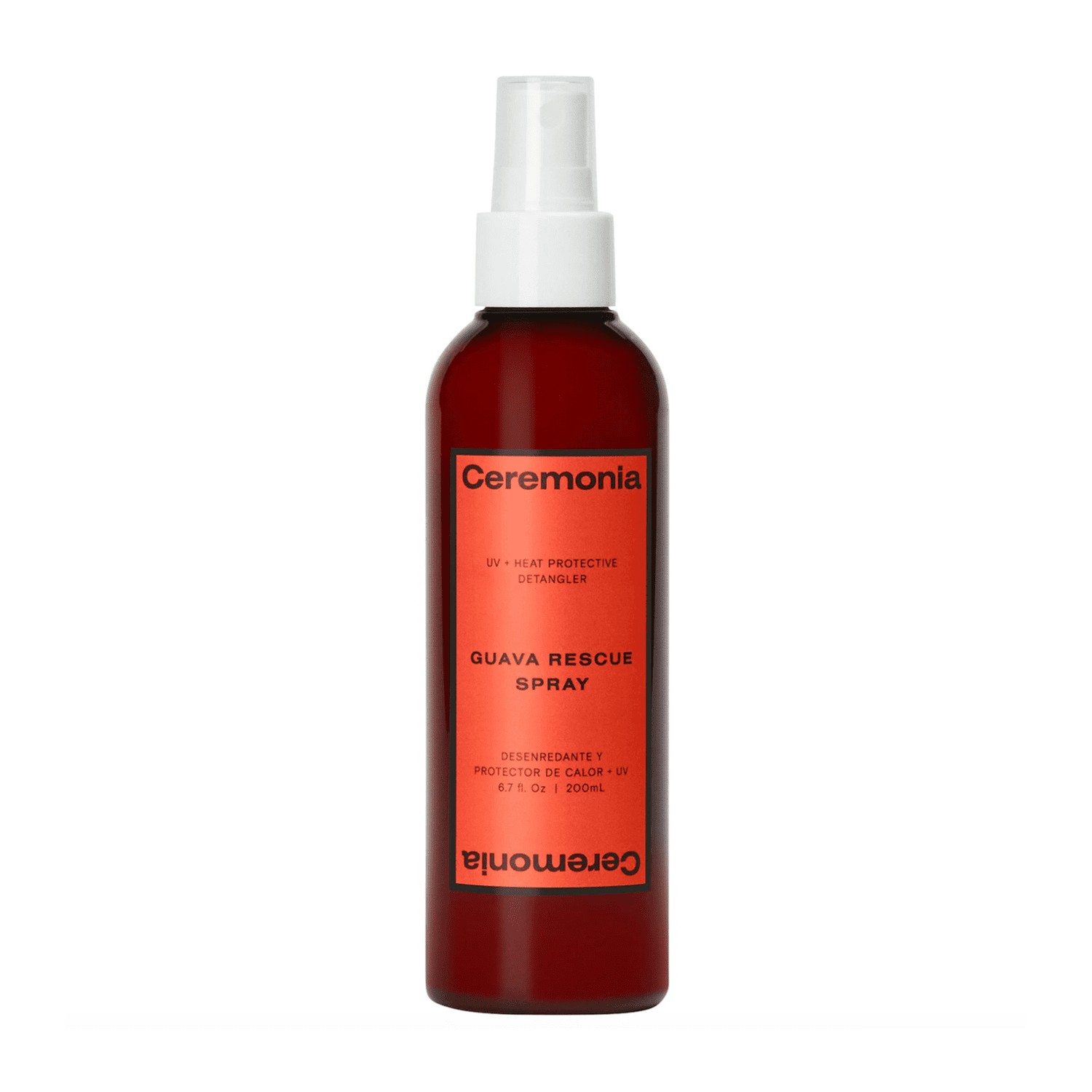 Brown bottle with blood orange Ceremonia label and white spray top